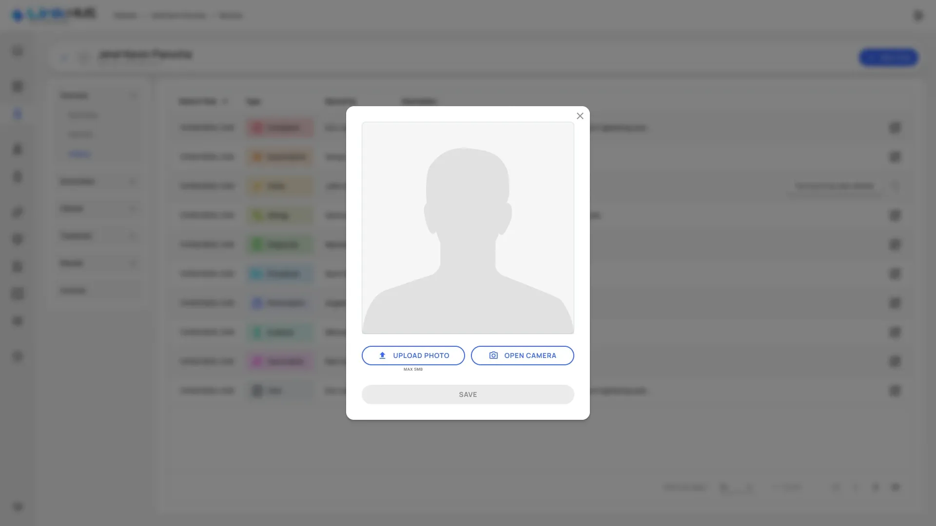 Empty Patient photo dialog over the record with a placeholder, Upload Photo and Open Camera buttons and a disabled Save